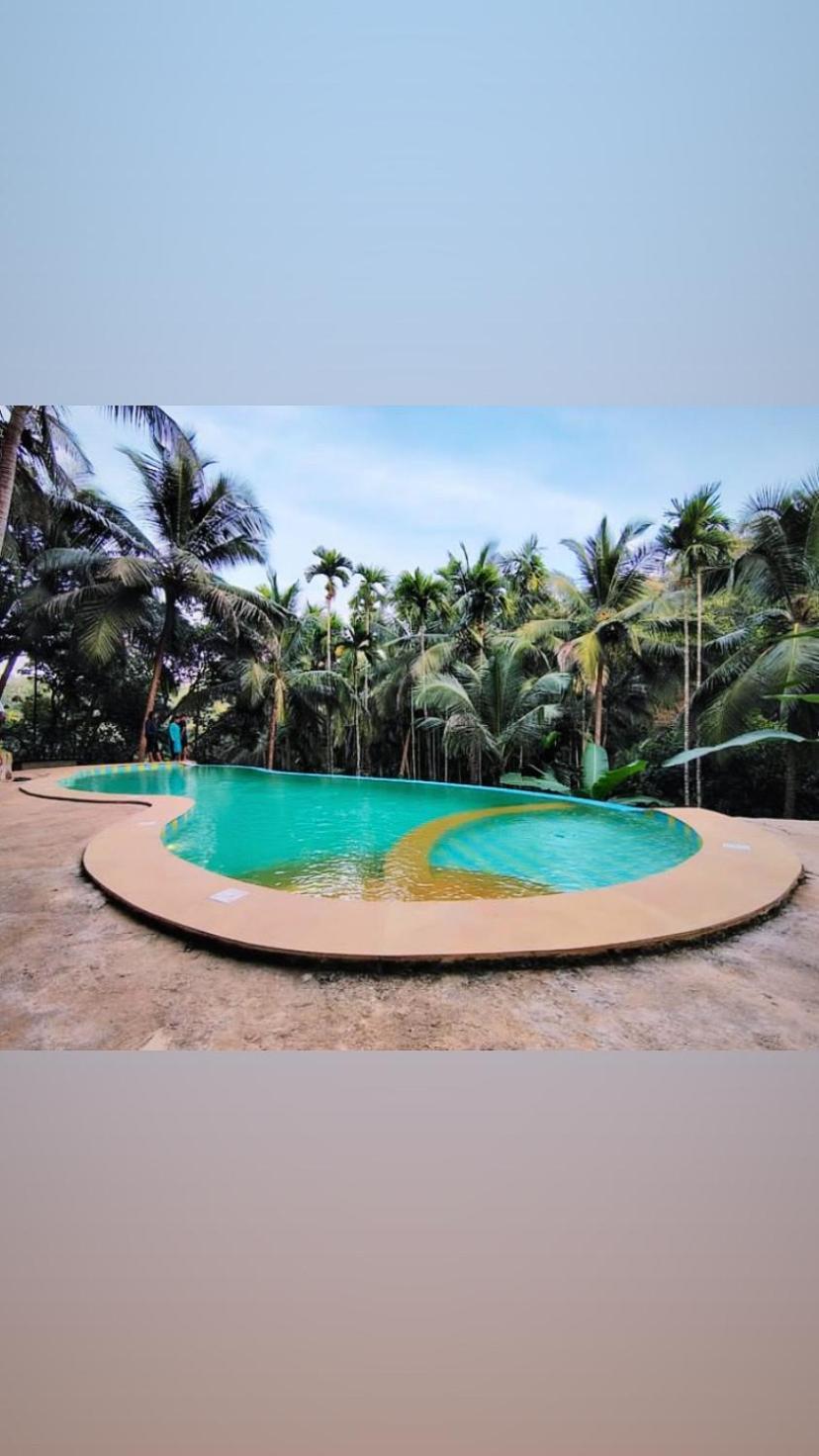 Atmani Waterfront Resort Cola Luaran gambar